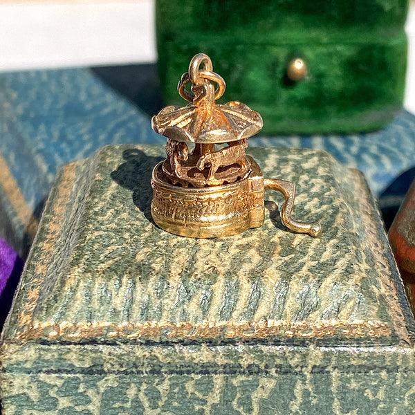 Vintage Mechanical Carousel Charm sold by Doyle and Doyle an antique and vintage jewelry boutique