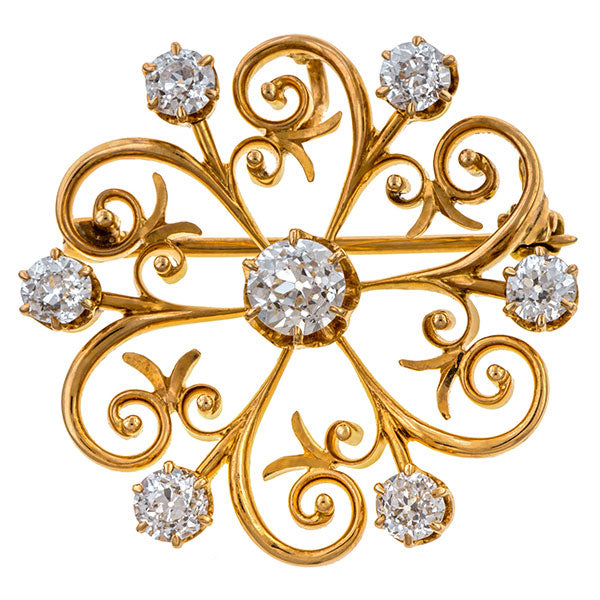 Antique Diamond Pinwheel Brooch sold by Doyle and Doyle an antique and vintage jewelry boutique