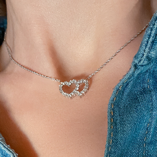 Vintage Diamond Double Heart Necklace sold by Doyle and Doyle an antique and vintage jewelry boutique