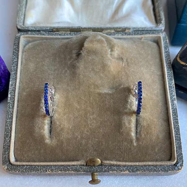 Sapphire Huggies sold by Doyle and Doyle an antique and vintage jewelry boutique