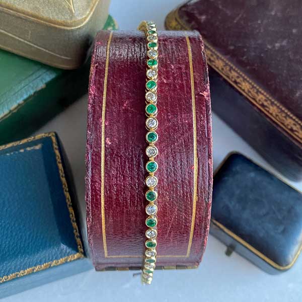 Vintage Emerald & Diamond Tennis Bracelet sold by Doyle and Doyle an antique and vintage jewelry boutique