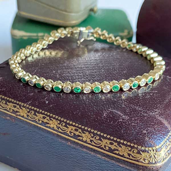 Vintage Emerald & Diamond Tennis Bracelet sold by Doyle and Doyle an antique and vintage jewelry boutique