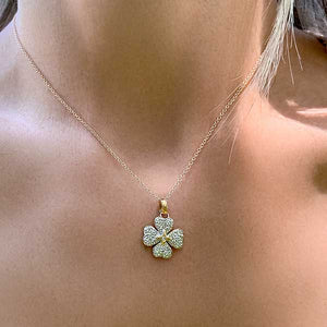 Vintage Diamond Flower Pendant sold by Doyle and Doyle an antique and vintage jewelry boutique