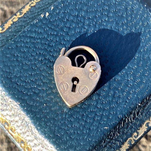 Vintage Heart Lock sold by Doyle and Doyle an antique and vintage jewelry boutique