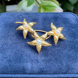 Vintage Tiffany & Co. Flower Brooch sold by Doyle and Doyle an antique and vintage jewelry boutique