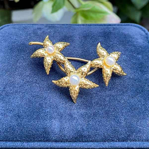 Vintage Tiffany & Co. Flower Brooch sold by Doyle and Doyle an antique and vintage jewelry boutique