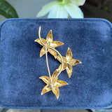 Vintage Tiffany & Co. Flower Brooch sold by Doyle and Doyle an antique and vintage jewelry boutique