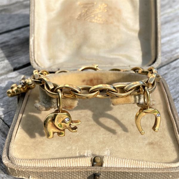 Vintage Charm Bracelet sold by Doyle and Doyle an antique and vintage jewelry boutique