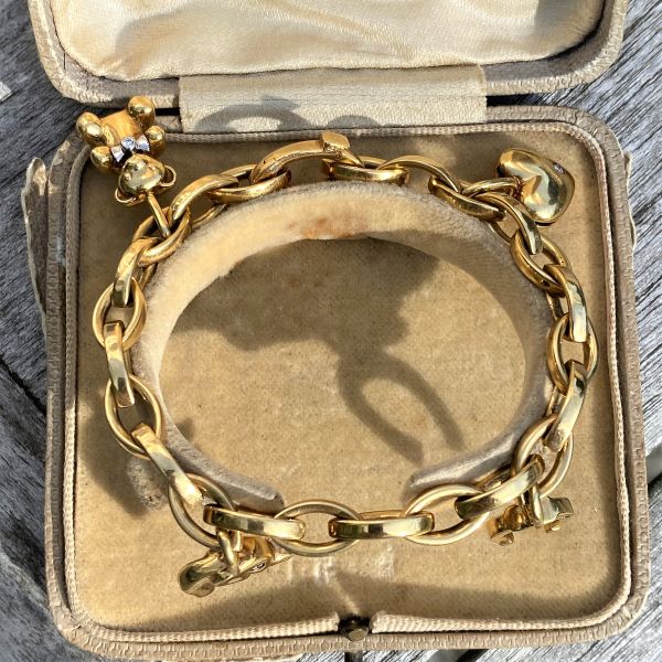 Vintage Charm Bracelet sold by Doyle and Doyle an antique and vintage jewelry boutique