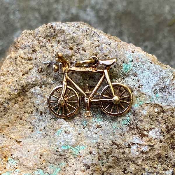 Antique Bike Charm sold by Doyle and Doyle an antique and vintage jewelry boutique