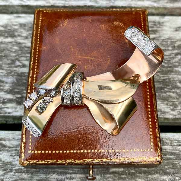 Retro Diamond Bow Brooch sold by Doyle and Doyle an antique and vintage jewelry boutique