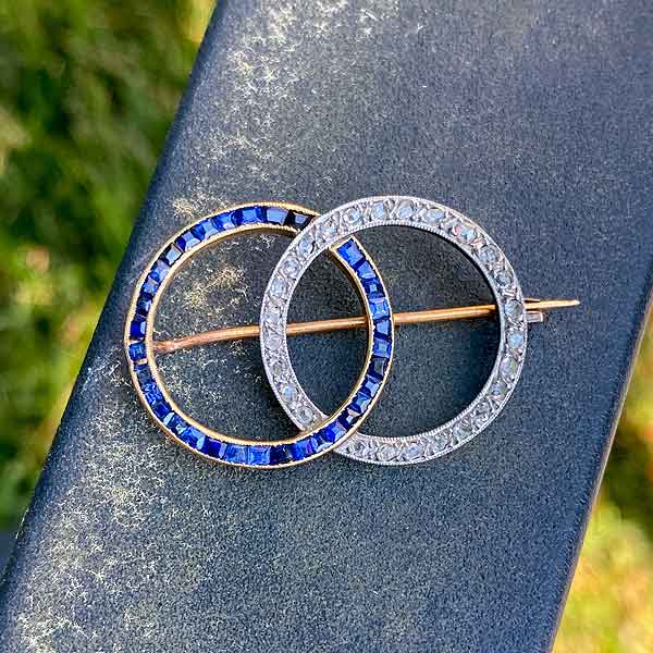 Diamond & Sapphire Double Circle Brooch sold by Doyle and Doyle an antique and vintage jewelry boutique