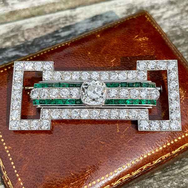 Art Deco Diamond & Emerald Pin sold by Doyle and Doyle an antique and vintage jewelry boutique