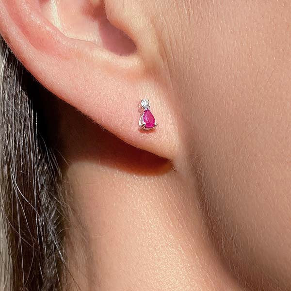 Pear Shaped Ruby and Diamond Stud Earrings, sold by Doyle & Doyle, an antique and vintage jewelry boutique.