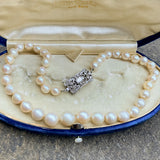 Vintage Single Stand Pearl Necklace sold by Doyle and Doyle an antique and vintage jewelry boutique