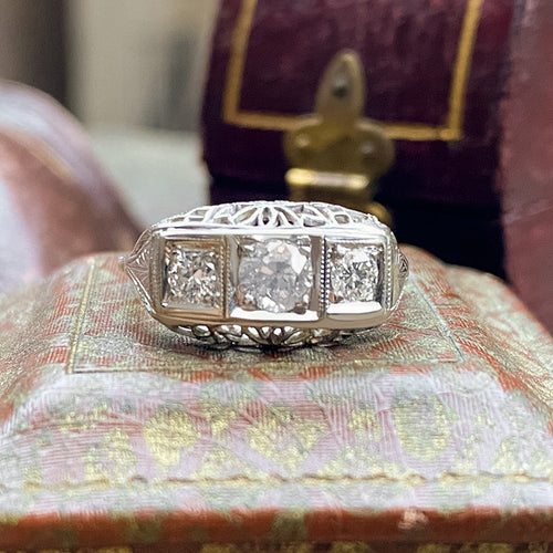 Vintage Three Diamond Filigree Ring sold by Doyle and Doyle an antique and vintage jewelry boutique