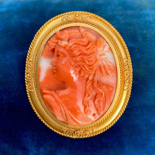 Victorian Carved Coral Cameo Pin sold by Doyle and Doyle an antique and vintage jewelry boutique