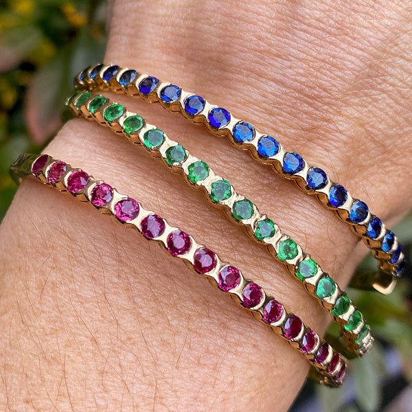 Vintage Ruby, Sapphire & Emerald Bangle Bracelets sold by Doyle and Doyle an antique and vintage jewelry boutique