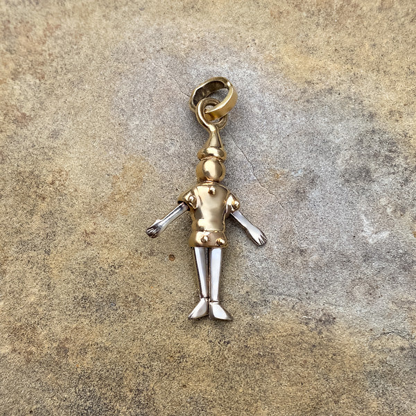 Vintage Pinocchio Charm sold by Doyle and Doyle an antique and vintage jewelry boutique