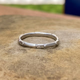 Vintage Patterned White Platinum Band sold by Doyle and Doyle an antique and vintage jewelry boutique