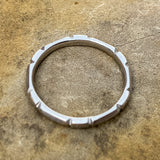 Vintage Patterned White Platinum Band sold by Doyle and Doyle an antique and vintage jewelry boutique