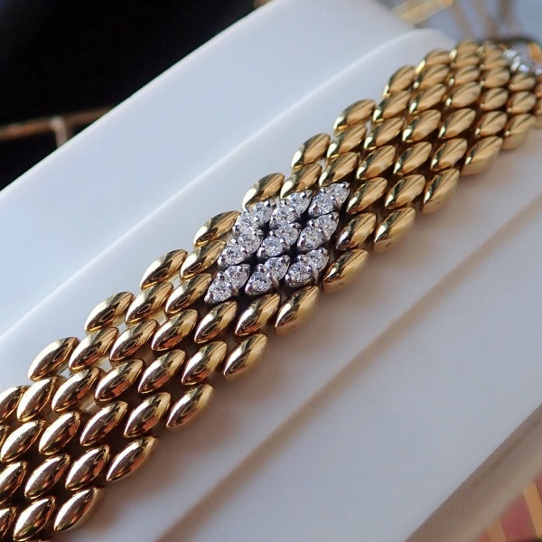 Vintage gold and diamond panther link bracelet from Doyle & Doyle