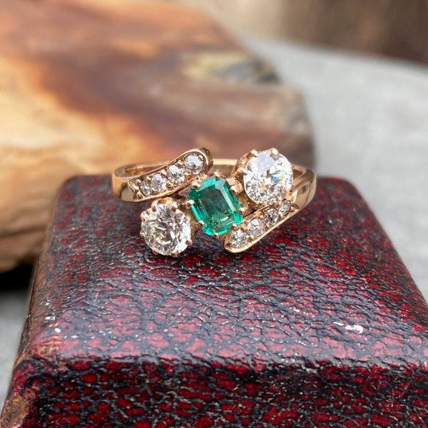 Antique Emerald & Diamond Bypass Ring sold by Doyle and Doyle an antique and vintage jewelry boutique