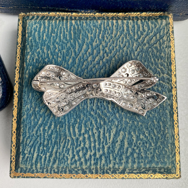 Art Deco Diamond Bow sold by Doyle and Doyle an antique and vintage jewelry boutique