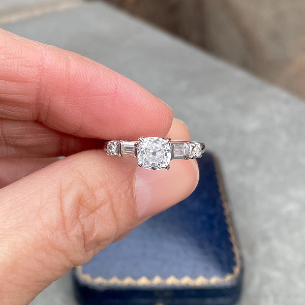 Vintage Cushion Cut Diamond Engagement ring with baguette diamonds, from Doyle & Doyle.