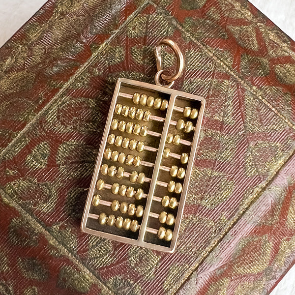 Vintage Abacus Charm sold by Doyle and Doyle an antique and vintage jewelry boutique