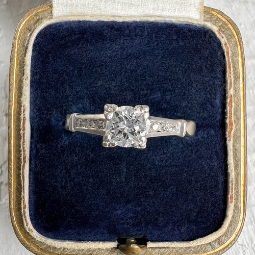 Vintage Diamond Engagement Ring with tapered diamond sides, from Doyle & Doyle an antique and vintage jewelry boutique