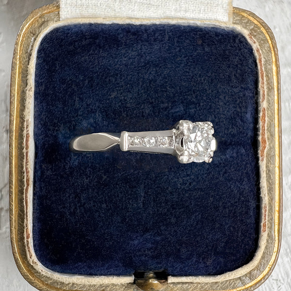 Vintage Diamond Engagement Ring with tapered diamond sides, from Doyle & Doyle an antique and vintage jewelry boutique