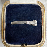 Vintage Diamond Engagement Ring with tapered diamond sides, from Doyle & Doyle an antique and vintage jewelry boutique