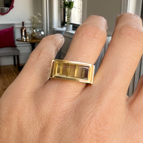 Estate Peridot Ring sold by Doyle and Doyle an antique and vintage jewelry boutique