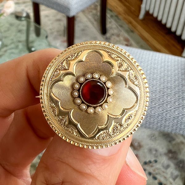 Antique Garnet & Pearl Pin sold by Doyle and Doyle an antique and vintage jewelry boutique