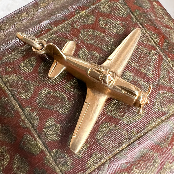 Antique Airplane Charm sold by Doyle and Doyle an antique and vintage jewelry boutique