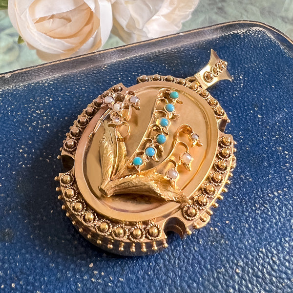 Victorian Turquoise & Pearl Lily of the Valley Locket sold by Doyle and Doyle an antique and vintage jewelry boutique