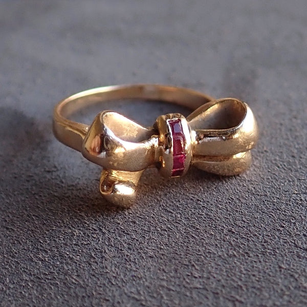 Vintage 1940s Retro ruby bow ring in 14k gold, from Doyle & Doyle vintage and antique jewelry.