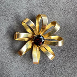 Vintage Garnet Pin sold by Doyle and Doyle an antique and vintage jewelry boutique