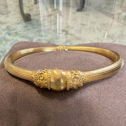 Vintage Etruscan Style Bracelet sold by Doyle and Doyle an antique and vintage jewelry boutique