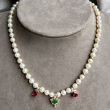Vintage Pearl Necklace with emerald and ruby drops, sold by Doyle & Doyle antique and vintage jewelry boutique