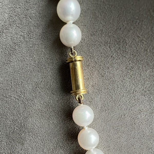 Vintage Pearl Necklace with emerald and ruby drops, sold by Doyle & Doyle antique and vintage jewelry boutique
