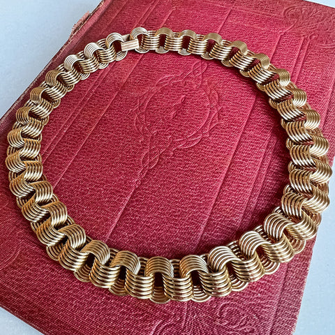 Vintage Coil Gold Link Necklace sold by Doyle and Doyle an antique and vintage jewelry boutique
