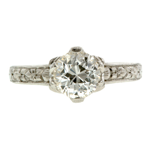 Contemporary ring: a Platinum Flower Shaped Old European Cut Diamond Heirloom Engagement Ring sold by Doyle & Doyle vintage and antique jewelry boutique.