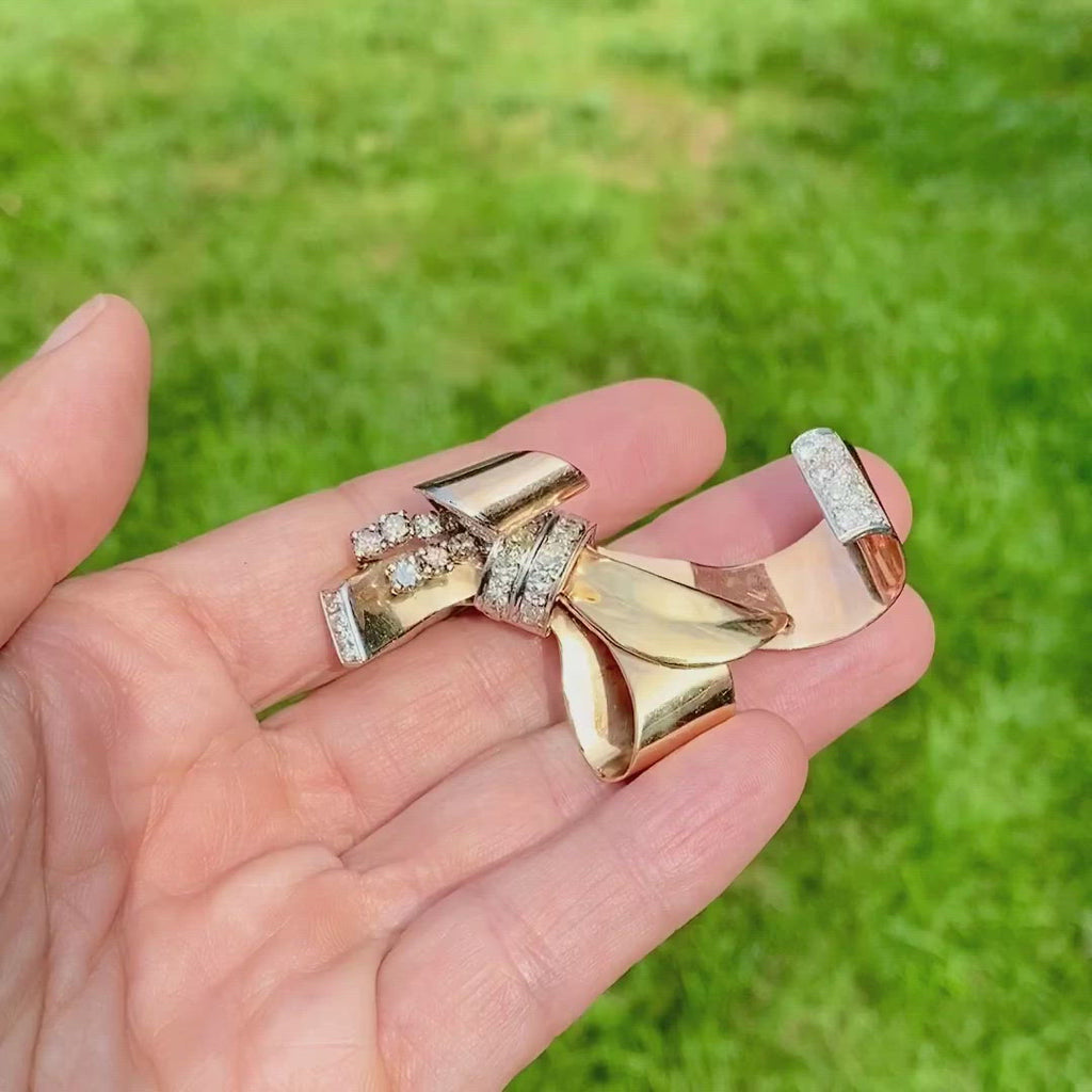 Retro Diamond Bow Brooch sold by Doyle and Doyle an antique and vintage jewelry boutique