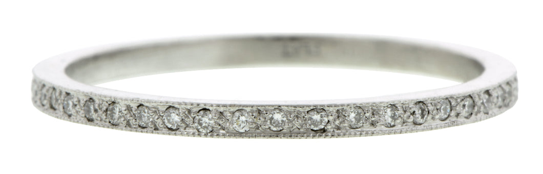 Contemporary ring: a Platinum Round Brilliant Cut Diamond Eternity Band sold by Doyle & Doyle vintage and antique jewelry boutique.