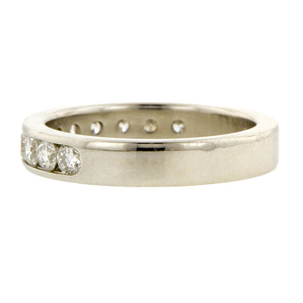 Estate ring: a Platinum Round Brilliant Cut Diamond Wedding Band sold by Doyle & Doyle vintage and antique jewelry boutique.