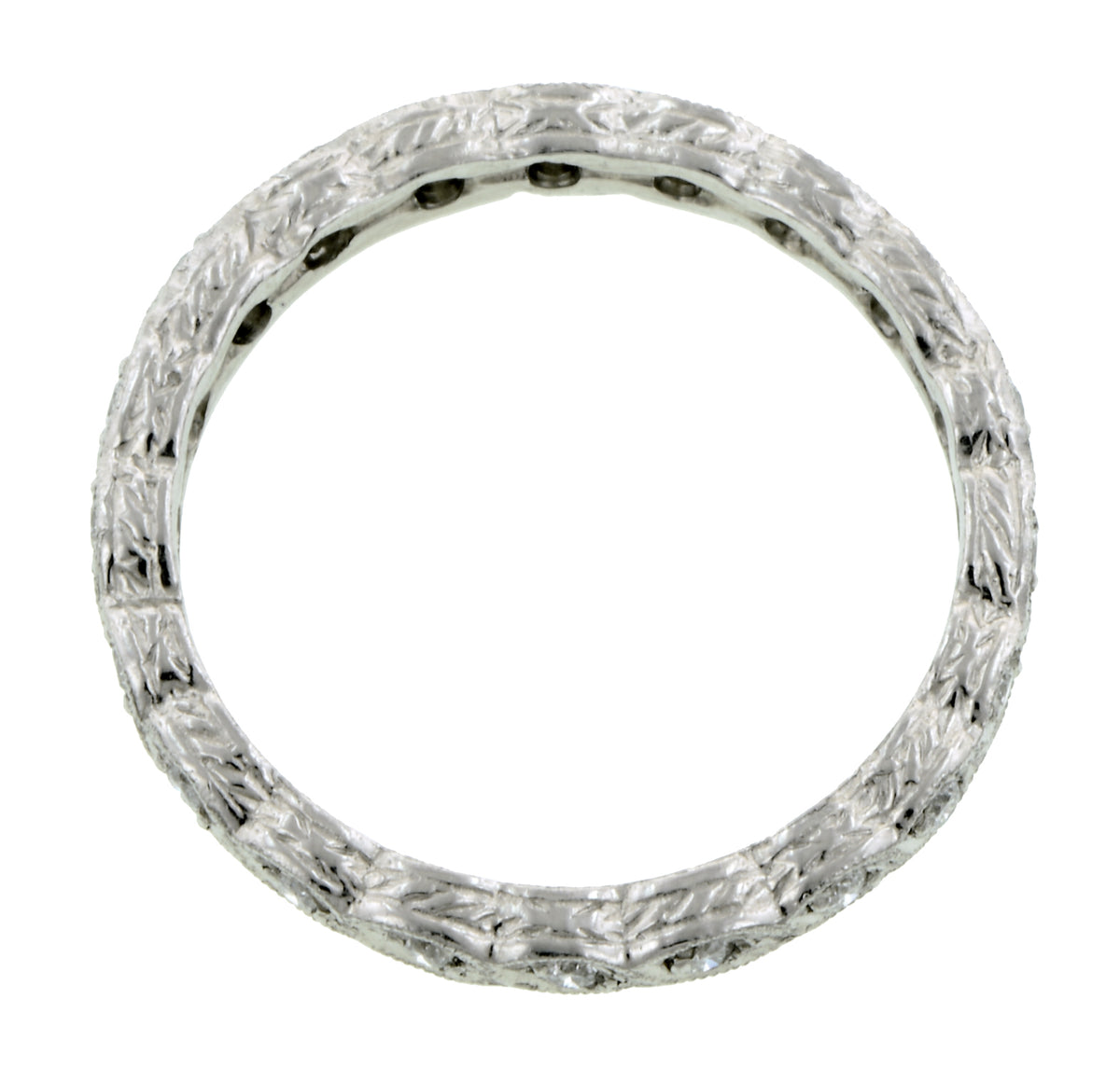Contemporary ring: a Platinum Diamond Eternity Twist Design Band sold by Doyle & Doyle vintage and antique jewelry boutique.