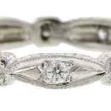 Contemporary ring: a Platinum Diamond .20ctw Eternity Band sold by Doyle & Doyle vintage and antique boutique.