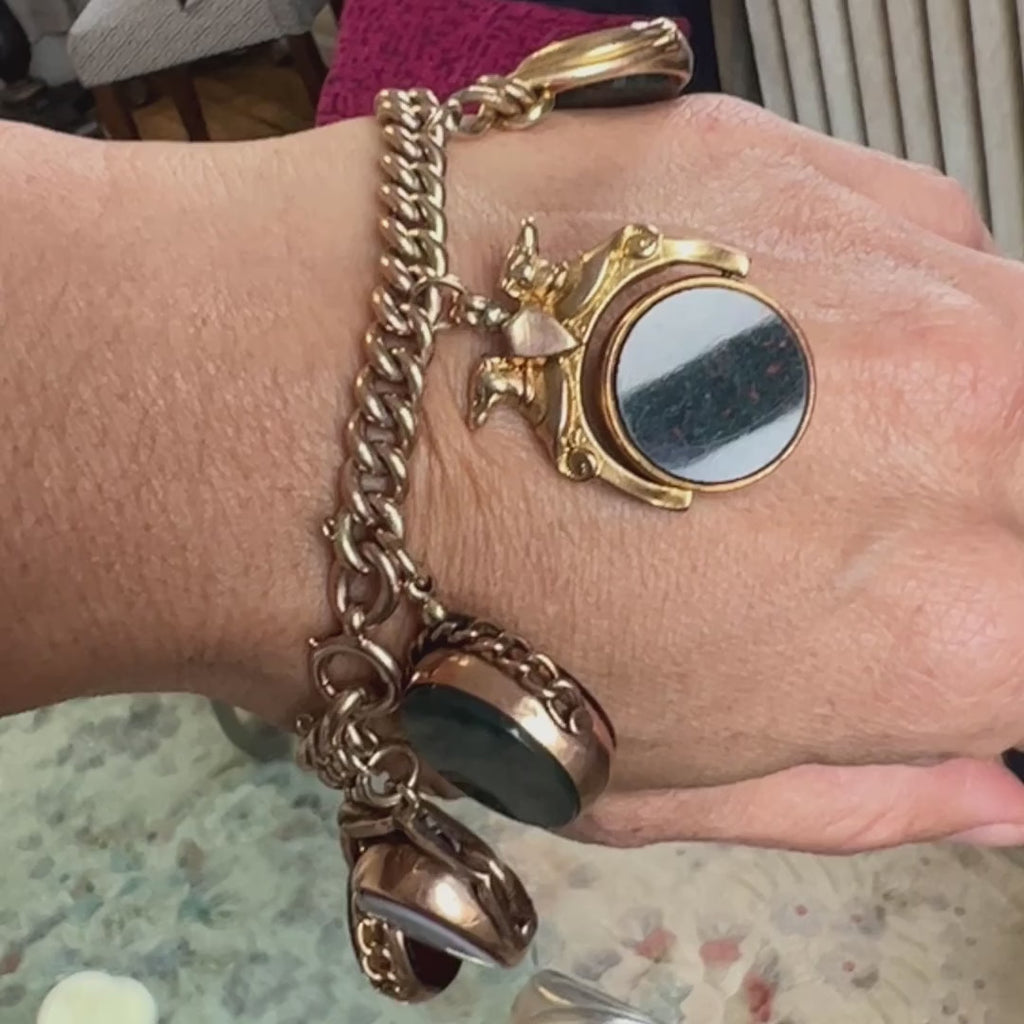 Victorian Swivel Charm Bracelet sold by Doyle and Doyle an antique and vintage jewelry boutique